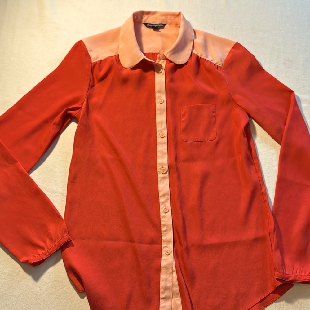 American Eagle Outfitters. Orange And Peach Long Sleeve button down blouse